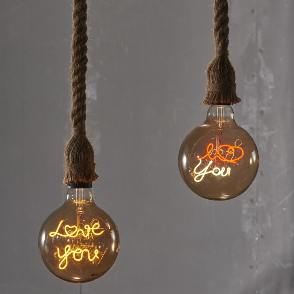 G125 Tea-Colored Custom Letter LED Globe Bulb with Hanging Single-Line Filament (2) G125 Tea-Colored Custom Letter LED Globe Bulb with Hanging Single-Line Filament (2)