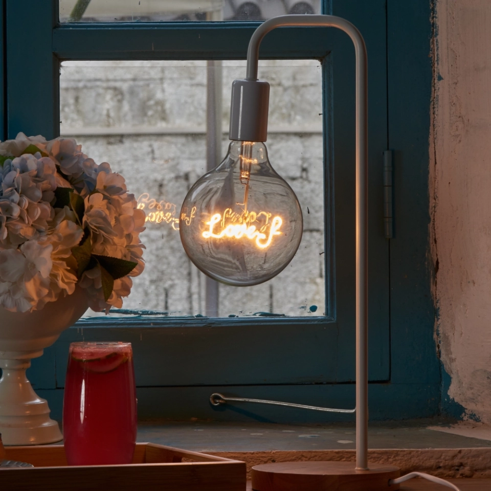 G125 Tea-Colored Custom Letter LED Globe Bulb with Hanging Single-Line Filament (3) G125 Tea-Colored Custom Letter LED Globe Bulb with Hanging Single-Line Filament (3)